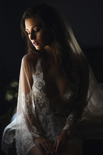 Bridal boudoir Idaho, woman in white lace.